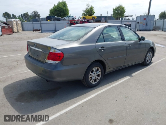 2005 Toyota Camry LE with VIN 4T1BF32K35U590150, listed as a IAAI auction lot 42053337 with 180,627 mi miles and . Bid and sale history available at DreamBid. Image 4.