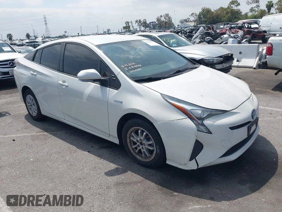 2016 Toyota Prius Two z VIN JTDKBRFU3G3024092, wystawiony jako IAAI lot #42338381 z przebiegiem 87 216 mil mil oraz . Historia ofert i sprzedaży dostępna na DreamBid. Obrazek 1.