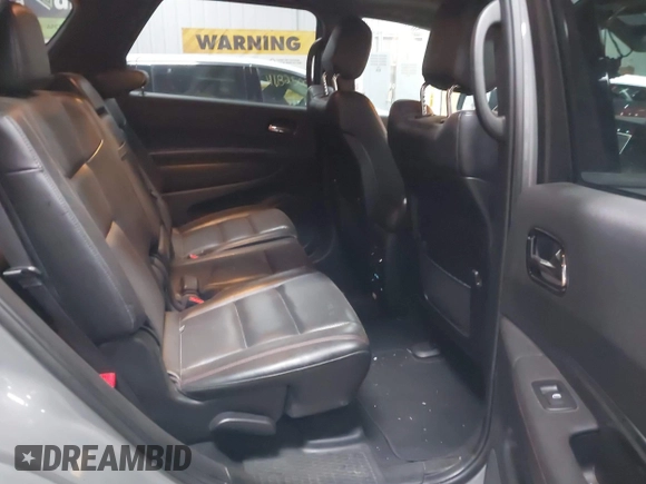 2023 Dodge Durango GT with VIN 1C4RDJDG4PC688019, listed as a IAAI auction lot 41871087 with 36,848 mi miles and . Bid and sale history available at DreamBid. Image 8.
