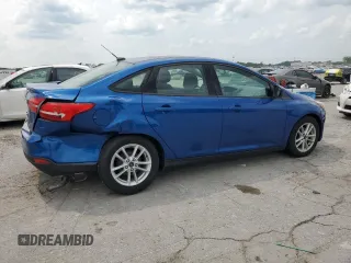 2018 Ford Focus SE with VIN 1FADP3F23JL214428, listed as a Copart auction lot 60552465 with 33,699 mi miles and Salvage title. Bid and sale history available at DreamBid. Image 4.