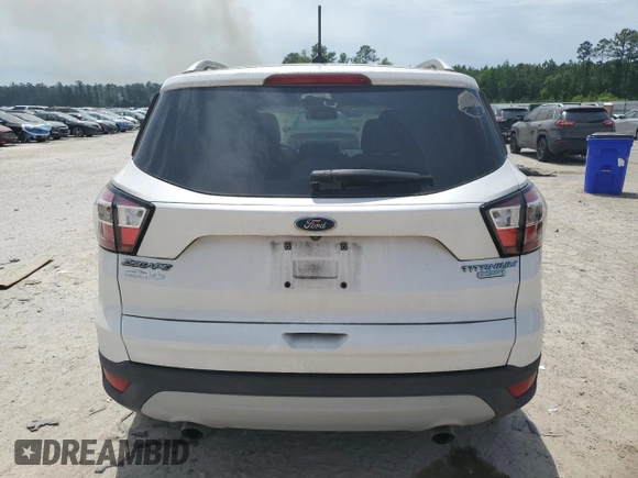 2018 Ford Escape Titanium with VIN 1FMCU0J99JUA06741, listed as a Copart auction lot 55782195 with 103,392 mi miles and Salvage title. Bid and sale history available at DreamBid. Image 6.