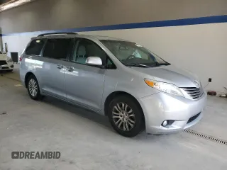 2015 Toyota Sienna XLE with VIN 5TDYK3DC9FS589378, listed as a Copart auction lot 54219075 with 117,766 mi miles and Salvage Title. Bid and sale history available at DreamBid. Image 4.