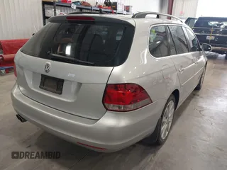 2012 Volkswagen Jetta SportWagen TDI with VIN 3VWML7AJ4CM668312, listed as a IAAI auction lot 41998809 with 130,866 mi miles. Bid and sale history available at carsss.com. Image 4.