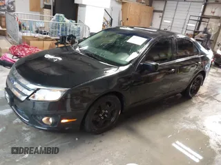 2011 Ford Fusion SE with VIN 3FAHP0HA4BR105757, listed as a IAAI auction lot 41945769 with 148,833 mi miles. Bid and sale history available at carsss.com. Image 2.