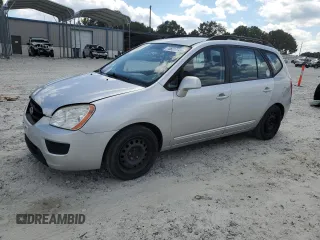 2009 Kia Rondo LX Base with VIN KNAFG528897229906, listed as a Copart auction lot 70821774 with 126,423 mi miles and Clean Title. Bid and sale history available at carsss.com. Image 1.