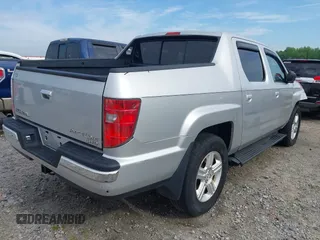 2009 Honda Ridgeline RTL with VIN 2HJYK16539H500986, listed as a IAAI auction lot 42084176 with 161,142 mi miles and . Bid and sale history available at DreamBid. Image 4.