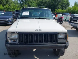 1996 Jeep Cherokee Sport z VIN 1J4FJ68S3TL226188, wystawiony jako IAAI lot #42460538 z przebiegiem 217 118 mil mil oraz . Historia ofert i sprzedaży dostępna na DreamBid. Obrazek 12.