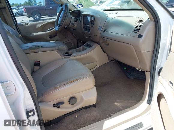 2002 Ford Expedition Eddie Bauer with VIN 1FMRU17L92LA42990, listed as a IAAI auction lot 42566608 with Not provided miles and . Bid and sale history available at DreamBid. Image 5.