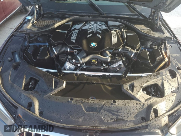 2022 BMW 8 Series M850i с VIN WBAGV8C06NCH25022, выставлен на аукционе Copart как лот 75720384 с пробегом Не указан миль и На запчасти • Non repairable. История ставок и продаж доступна на DreamBid. Изображение 11.