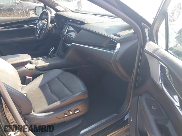 2023 Cadillac XT5 AWD Premium Luxury with VIN 1GYKNDRS7PZ158566, listed as a IAAI auction lot 41763127 with 58,248 mi miles and . Bid and sale history available at DreamBid. Image 5.