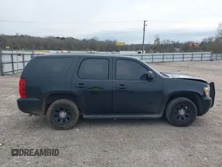 2011 Chevrolet Tahoe Commercial with VIN 1GNLC2E01BR289534, listed as a IAAI auction lot 41670183 with 119,422 mi miles and . Bid and sale history available at DreamBid. Image 14.