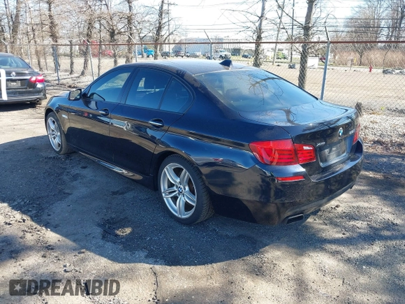 2013 BMW 5 Series 550i xDrive with VIN WBAFU9C52DDY70807, listed as a IAAI auction lot 41902163 with 92,021 mi miles and . Bid and sale history available at carsss.com. Image 3.