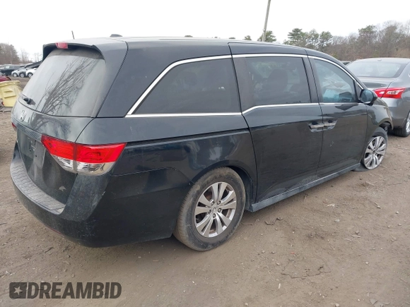 2015 Honda Odyssey EX-L with VIN 5FNRL5H60FB011806, listed as a IAAI auction lot 41791543 with 161,116 mi miles and . Bid and sale history available at DreamBid. Image 4.