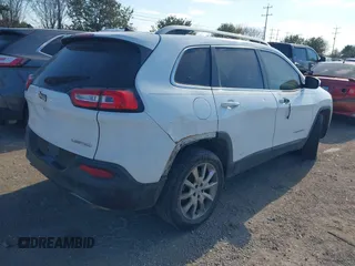 2014 Jeep Cherokee Limited with VIN 1C4PJLDSXEW118473, listed as a IAAI auction lot 41359322 with 111,000 mi miles. Bid and sale history available at carsss.com. Image 4.