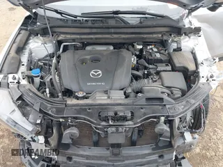 2021 Mazda CX-5 Grand Touring with VIN JM3KFBDM4M0371496, listed as a IAAI auction lot 42428860 with 113,735 mi miles and . Bid and sale history available at DreamBid. Image 10.
