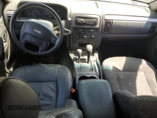 2004 Jeep Grand Cherokee Laredo with VIN 1J4GW48S34C343281, listed as a Copart auction lot 63253325 with 247,697 mi miles and Clean title. Bid and sale history available at DreamBid. Image 8.