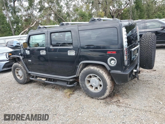 2003 Hummer H2 with VIN 5GRGN23U93H111760, listed as a Copart auction lot 79600154 with 154,552 mi miles and Salvage Title. Bid and sale history available at carsss.com. Image 2.