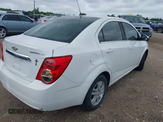 2015 Chevrolet Sonic LT with VIN 1G1JC5SH8F4213297, listed as a IAAI auction lot 42035646 with 152,628 mi miles and . Bid and sale history available at DreamBid. Image 4.