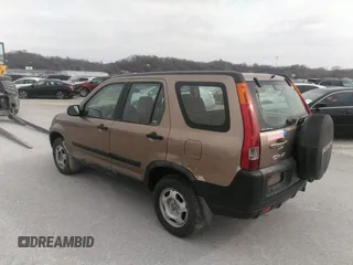 2004 Honda CR-V LX with VIN JHLRD78454C024250, listed as a IAAI auction lot 41227320 with 317,109 mi miles and . Bid and sale history available at carsss.com. Image 3.