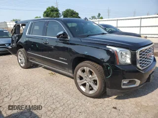 2019 GMC Yukon XL Denali with VIN 1GKS2HKJ7KR174772, listed as a Copart auction lot 63087134 with 69,692 mi miles and Salvage Title. Bid and sale history available at carsss.com. Image 4.