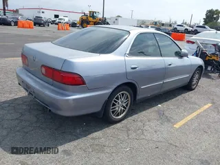 1999 Acura Integra z VIN JH4DB7660XS000593, wystawiony jako IAAI lot #42339059 z przebiegiem 77 805 mil mil oraz . Historia ofert i sprzedaży dostępna na DreamBid. Obrazek 4.