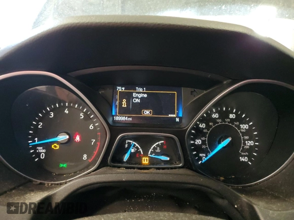 2015 Ford Focus SE z VIN 1FADP3F29FL255928, wystawiony jako Copart lot #72643654 z przebiegiem 189 984 mil mil oraz Szkoda całkowita • Salvage title. Historia ofert i sprzedaży dostępna na DreamBid. Obrazek 9.