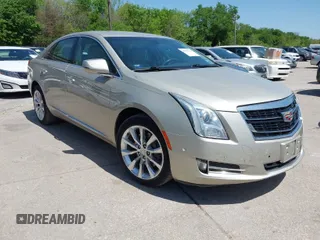 2016 Cadillac XTS Luxury Collection with VIN 2G61M5S31G9146455, listed as a IAAI auction lot 42019234 with 72,019 mi miles. Bid and sale history available at carsss.com. Image 1.