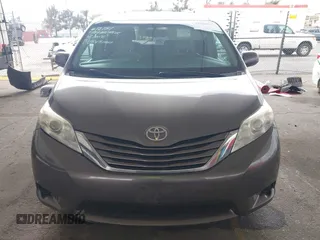2015 Toyota Sienna LE AAS with VIN 5TDKK3DC8FS585957, listed as a IAAI auction lot 41888825 with 157,364 mi miles and . Bid and sale history available at DreamBid. Image 13.