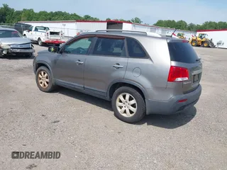 2011 Kia Sorento LX with VIN 5XYKT4A1XBG061125, listed as a IAAI auction lot 42576972 with 201,187 mi miles and . Bid and sale history available at DreamBid. Image 3.