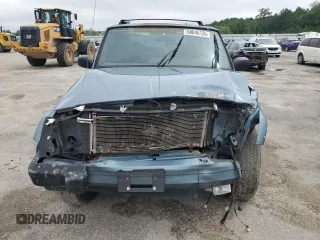 1999 Jeep Cherokee Sport с VIN 1J4FT68S9XL552299, выставлен на аукционе Copart как лот 58045135 с пробегом Не указан миль и Списание • Salvage title. История ставок и продаж доступна на DreamBid. Изображение 5.