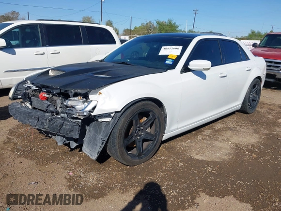2012 Chrysler 300 SRT-8 with VIN 2C3CCAFJ9CH801749, listed as a IAAI auction lot 40912606 with 144,404 mi miles and . Bid and sale history available at DreamBid. Image 18.