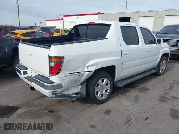 2006 Honda Ridgeline RTL z VIN 2HJYK16586H519593, wystawiony jako IAAI lot #42111678 z przebiegiem 244 962 mil mil oraz . Historia ofert i sprzedaży dostępna na DreamBid. Obrazek 4.