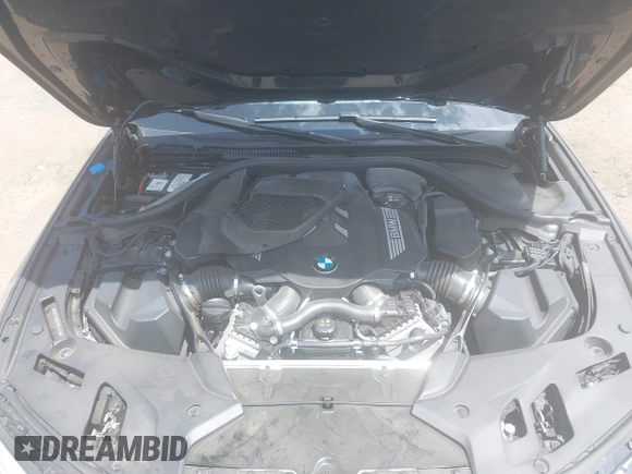 2023 BMW 5 Series M550i xDrive with VIN WBA13BK02PCN47443, listed as a IAAI auction lot 42290388 with Not provided miles and . Bid and sale history available at DreamBid. Image 10.