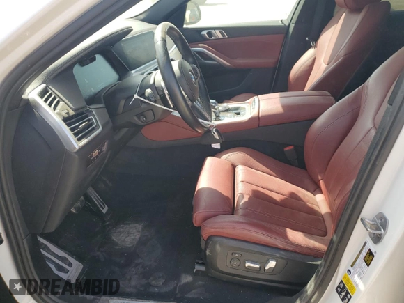 2022 BMW X6 xDrive40i z VIN 5UXCY6C0XN9K78927, wystawiony jako Copart lot #48348335 z przebiegiem 63 074 mil mil oraz Szkoda całkowita • Salvage title. Historia ofert i sprzedaży dostępna na DreamBid. Obrazek 7.