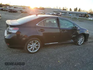 2010 Lexus HS 250h with VIN JTHBB1BA1A2001161, listed as a Copart auction lot 87281574 with 88,808 mi miles and Salvage Title. Bid and sale history available at DreamBid. Image 3.