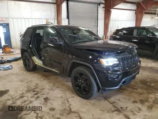 2020 Jeep Grand Cherokee Laredo E with VIN 1C4RJFAG9LC118683, listed as a Copart auction lot 61493395 with 84,204 mi miles and Salvage title. Bid and sale history available at DreamBid. Image 4.