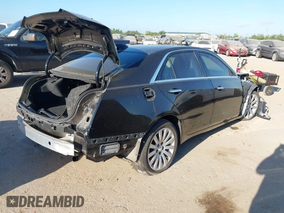 2017 Cadillac CTS Luxury AWD with VIN 1G6AX5SX7H0124482, listed as a IAAI auction lot 42803328 with 70,700 mi miles and . Bid and sale history available at DreamBid. Image 4.