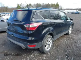 2018 Ford Escape SEL with VIN 1FMCU9HD8JUC25026, listed as a IAAI auction lot 41840888 with 110,325 mi miles. Bid and sale history available at carsss.com. Image 4.