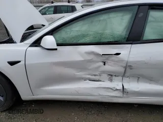 2022 Tesla Model 3 with VIN 5YJ3E1EA9NF360138, listed as a Copart auction lot 50041705 with 16,254 mi miles and Salvage Title. Bid and sale history available at carsss.com. Image 7.