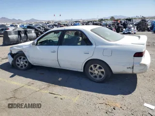 1998 Toyota Camry LE z VIN JT2BF28K3W0115122, wystawiony jako Copart lot #52645095 z przebiegiem 361 549 mil mil oraz Szkoda całkowita • Salvage title. Historia ofert i sprzedaży dostępna na DreamBid. Obrazek 2.