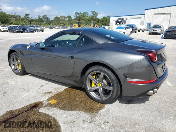 2015 Ferrari California T с VIN ZFF77XJA3F0206563, выставлен на аукционе Copart как лот 73751534 с пробегом Не указан миль и Списание • Salvage title. История ставок и продаж доступна на DreamBid. Изображение 2.
