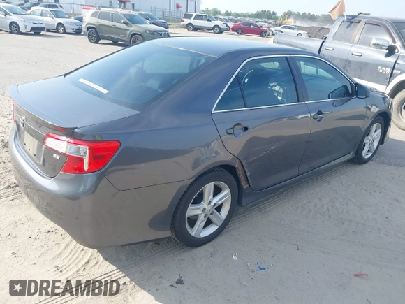 2014 Toyota Camry L with VIN 4T1BF1FK5EU744839, listed as a IAAI auction lot 42101173 with 255,137 mi miles. Bid and sale history available at carsss.com. Image 4.