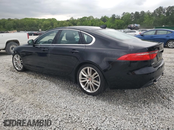 2016 Jaguar XF 35t Prestige with VIN SAJBE4BVXGCY03824, listed as a Copart auction lot 52516645 with 96,616 mi miles and Salvage Title. Bid and sale history available at carsss.com. Image 2.