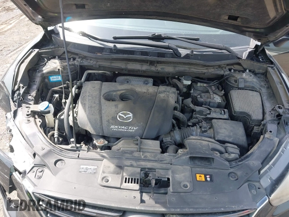 2016 Mazda CX-5 Sport with VIN JM3KE4BY8G0746377, listed as a IAAI auction lot 41990988 with 144,558 mi miles and . Bid and sale history available at carsss.com. Image 10.