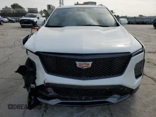 2024 Cadillac XT4 AWD Sport с VIN 1GYFZFR47RF125557, выставлен на аукционе Copart как лот 70869104 с пробегом 8 714 миль миль и Списание • Salvage title. История ставок и продаж доступна на DreamBid. Изображение 5.