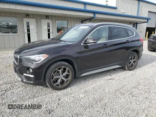 2019 BMW X1 xDrive28i z VIN WBXHT3C53K5N27090, wystawiony jako Copart lot #54150485 z przebiegiem 79 835 mil mil oraz Szkoda całkowita • Salvage title. Historia ofert i sprzedaży dostępna na DreamBid. Obrazek 1.