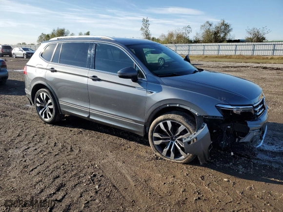 2020 Volkswagen Tiguan SEL Premium R-Line with VIN 3VV4B7AXXLM068664, listed as a Copart auction lot 83243264 with 132,734 mi miles and Salvage Title. Bid and sale history available at carsss.com. Image 4.