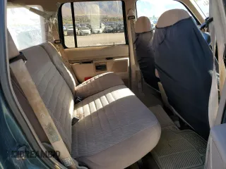 1994 Ford Explorer Eddie Bauer z VIN 1FMDU34X3RUC19020, wystawiony jako Copart lot #79036644 z przebiegiem 423 988 mil mil oraz Szkoda całkowita • Salvage title. Historia ofert i sprzedaży dostępna na DreamBid. Obrazek 10.