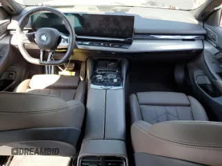 2024 BMW i5 eDrive40 with VIN WBY33FK03RCS14771, listed as a Copart auction lot 62393255 with 25,192 mi miles and Salvage title. Bid and sale history available at DreamBid. Image 8.