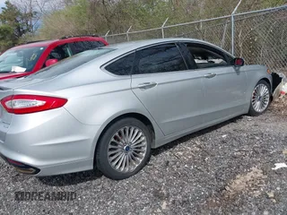 2016 Ford Fusion Titanium with VIN 3FA6P0K95GR400718, listed as a IAAI auction lot 41957913 with 133,037 mi miles. Bid and sale history available at carsss.com. Image 4.